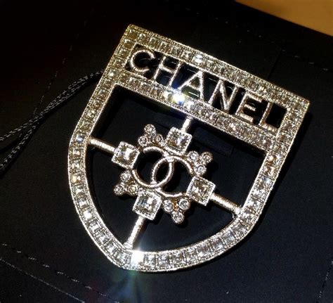 how to spot a fake chanel brooch|authentic chanel counterfeit.